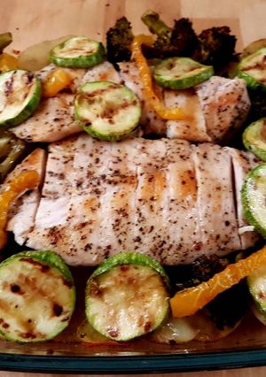 A picture of Grilled Chicken with roasted vegetables.