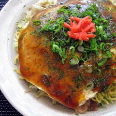 A picture of Hiroshima-Style Okonomiyaki.