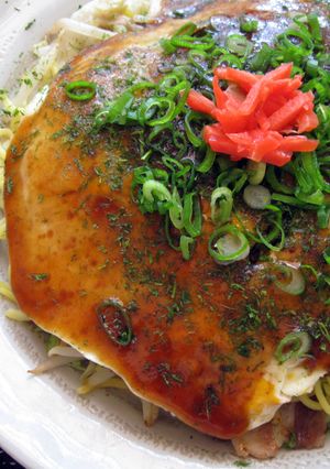 A picture of Hiroshima-Style Okonomiyaki.