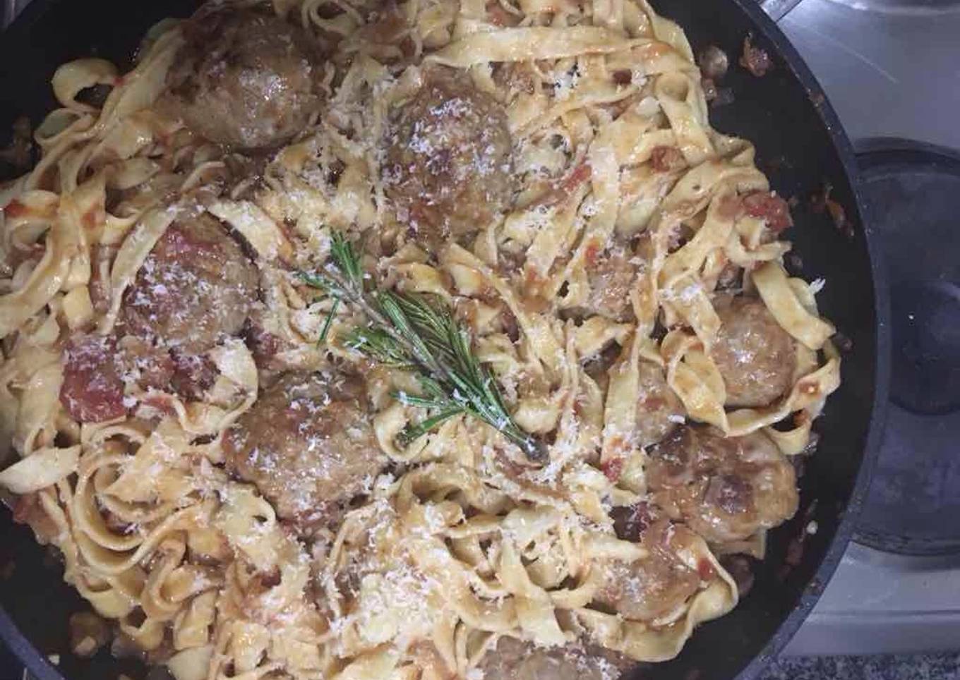 Pork and beef meatballs in a slow braised tomato sauce and pasta