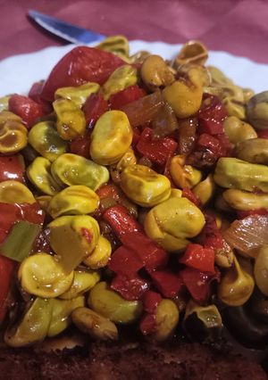 Una foto de Habitas guisadas al vermut