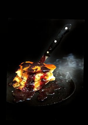 A picture of Halloween Spooky soul representing Banana Pancakes with Strawberry Sauce:.