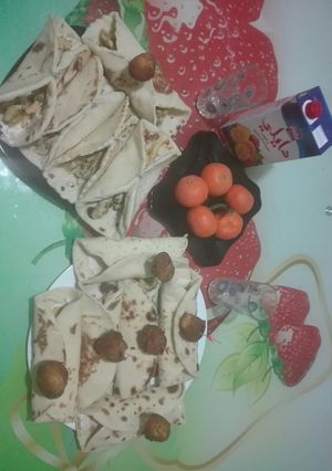 صورة لوصفة شاورما او طاكوس بخبز اكثر من راااائع