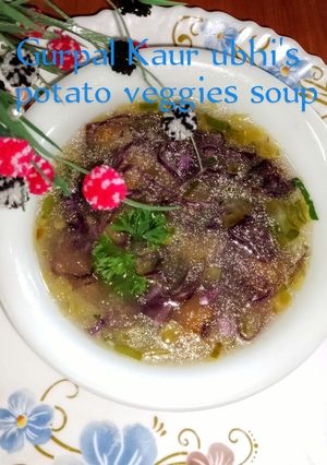 A picture of Potato veggies soup 🥔🥕🫛🥬.