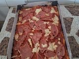 Pizza exprés con mortadela y queso