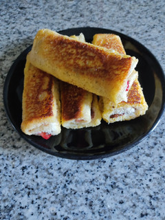 Una foto de Rollitos de Nutella y fresas