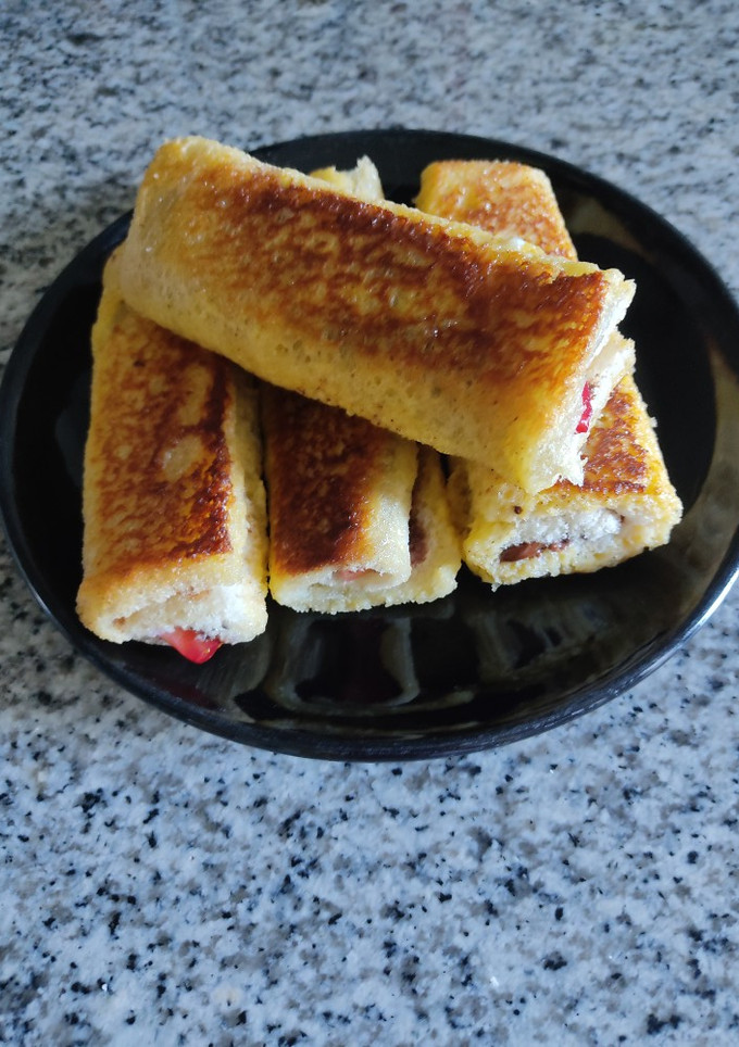 Una foto de Rollitos de Nutella y fresas