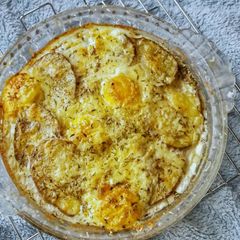 A picture of Baked Potato and Egg.