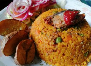 Una foto de Arroz de sardinas