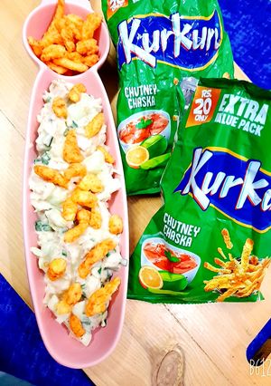 A picture of Salad chat with Kurkure.