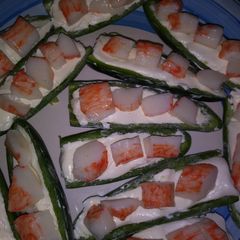 A picture of Texas Crabb an Cream Cheese jalapenos wrapped in Bacon.