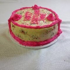 A picture of Strawberry cake using a jiko.