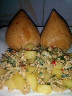 A picture of Potato egg souce with moi moi.