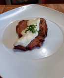 Chuletas de cerdo con salsa bechamel