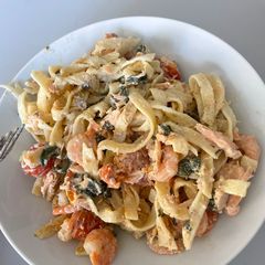 Salmon And Prawn Tagliatelle Oven Pasta A picture of Salmon And Prawn Tagliatelle Oven Pasta.