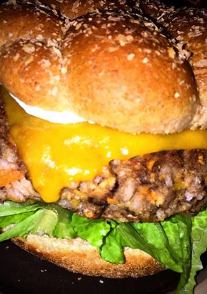 A picture of Deliciously simple veggie burgers .