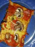 Pizza de pepperoni y champiñones