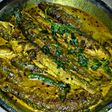 Bata Mach er Jhal (Bata fish in spicy mustard gravy)
