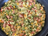 Arroz con verduras y salchichas Frankfurt