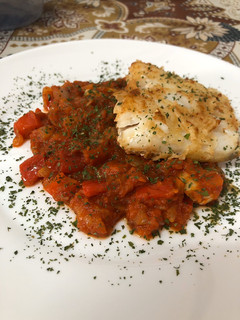 Una foto de Bacalao con tomate