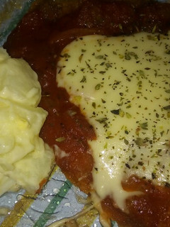 Una foto de Milanesa Napolitana con papa, huevos, ajo y mayonesa