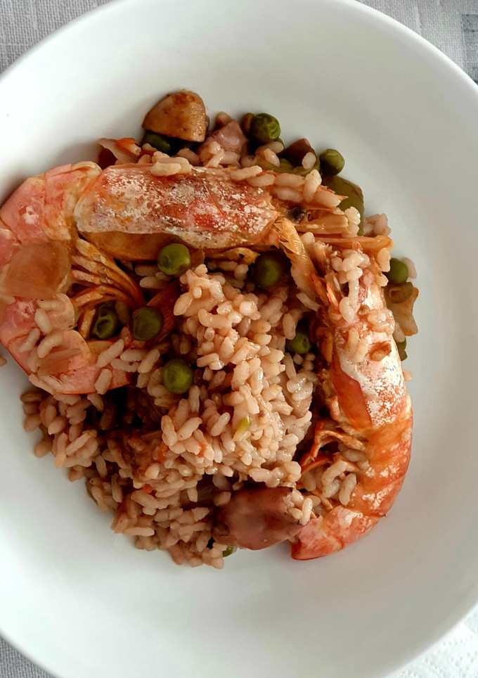 Una foto de Arroz con chipirones y gambas