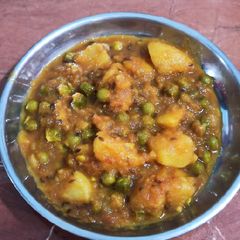 A picture of Aloo matar (In Cooker).