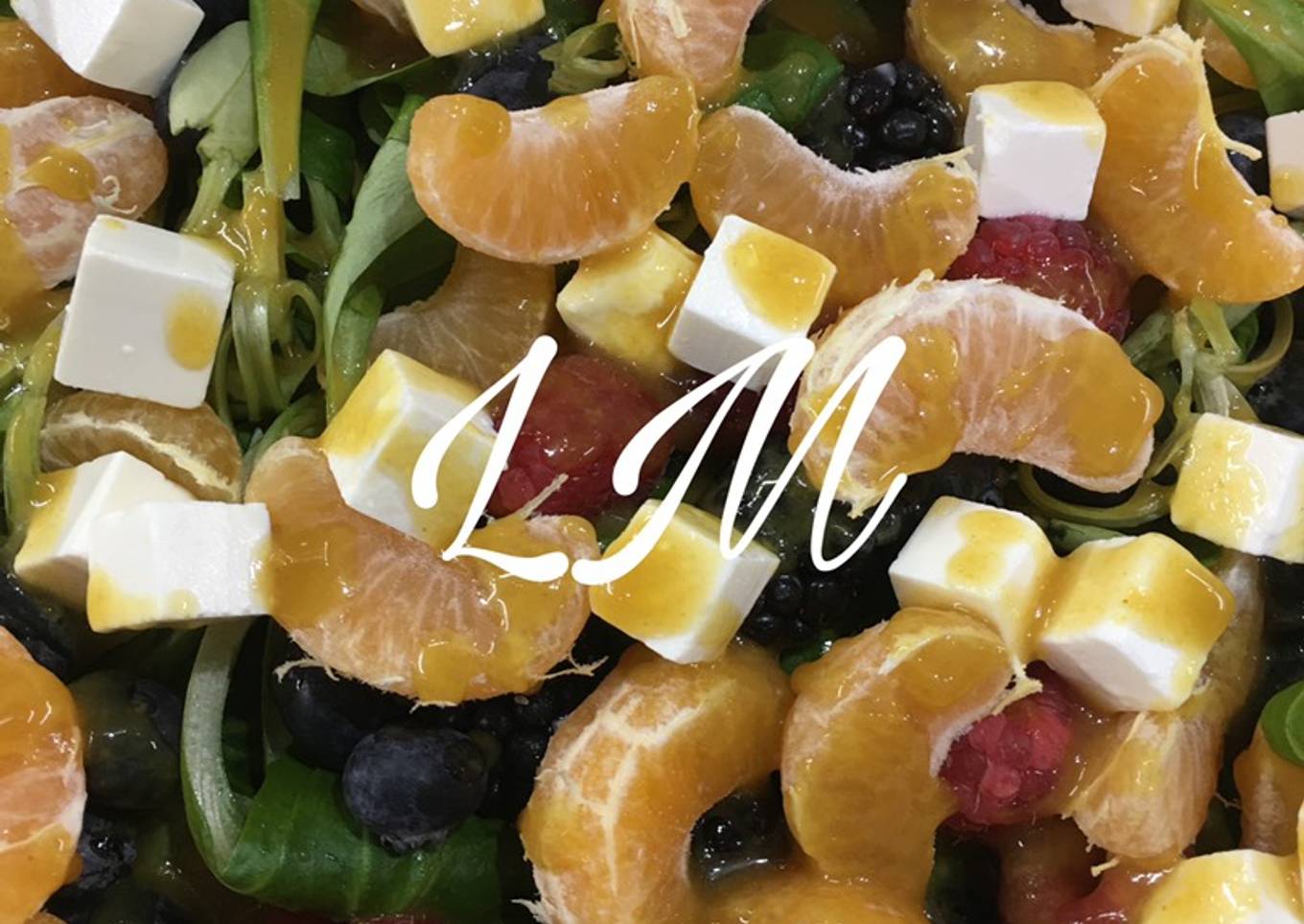 Ensalada de canónigos, mandarina y queso feta con vinagreta de miel