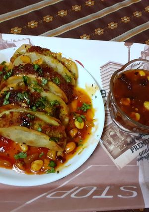 A picture of Mexican rice Tacos with dry fruits chutney.