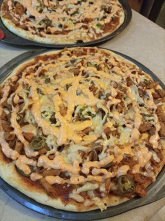 A picture of Red Sauce pasta pizza.