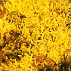 A picture of Dum Aloo gosht biryani.