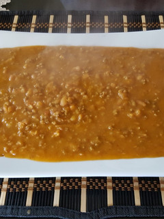 Una foto de Frijoles fritos con chorizo casero