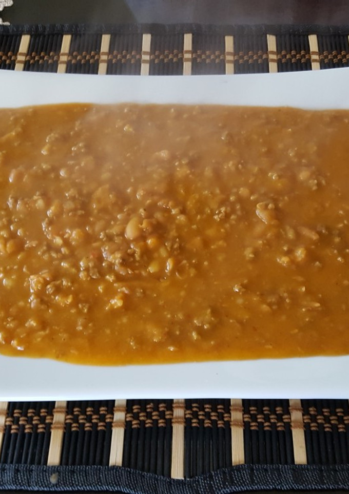 Una foto de Frijoles fritos con chorizo casero