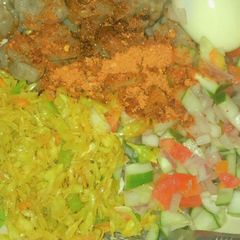 A picture of Flour and semolina dumplings (Dan wake) with veggies.