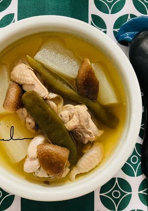 A picture of Chicken Soup with Pickled Chili Peppers and Winter Melon.