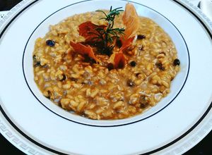Foto de Rizotto de Tomates Secos com Parmesão e Lascas de Prosciutto Crocante