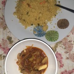 A picture of Fried couscous and veggies sauce.
