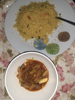A picture of Fried couscous and veggies sauce.