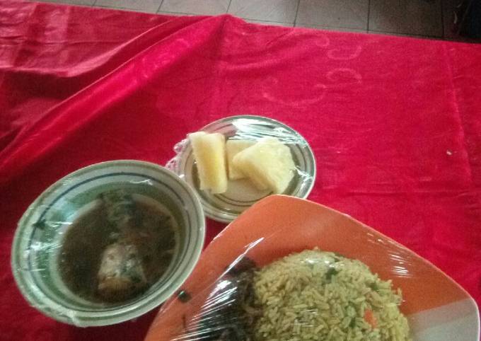 Fish pepper soup,fried rice with liver souce nd pineapplesegment