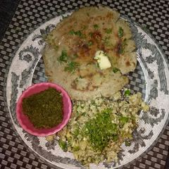 Bajra roti with scrumbeld egg A picture of Bajra roti with scrumbeld egg.