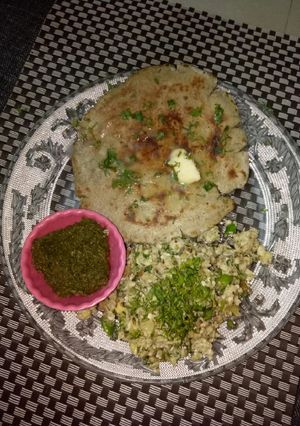 A picture of Bajra roti with scrumbeld egg.
