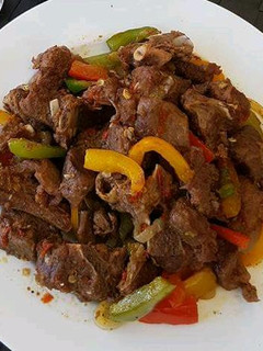 A picture of Spicy Asun (Spicy Grilled Goat meat).