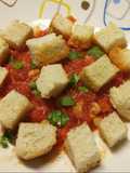 Crab with tomatoes, chilli and croutons