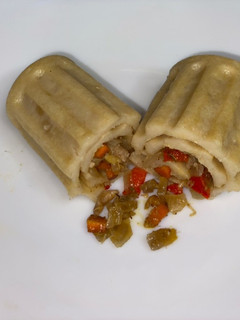 A picture of Title:Chicken pancake wrap.