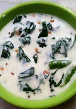 A picture of Malabar Spinach with Curds.