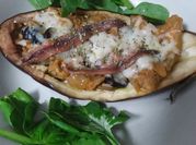 Una foto de berenjenas al horno con anchoa