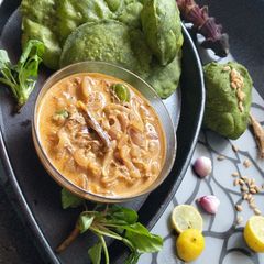 A picture of Palak Spinach Poori/Banana Flower Blossom Curry.