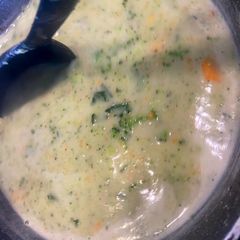 A picture of Creamy broccoli and cheddar soup.