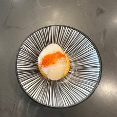 Amuse bouche - scallop with wasabi cream A picture of Amuse bouche - scallop with wasabi cream.
