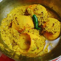 A picture of Egg Mustard seeds curry.